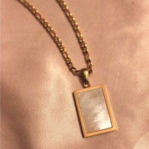 Gold plated figaro chain mother of pearl pendant necklace